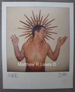 Young man with arms raised to either side, his head turned to side. Religious style. Torso. Crucifixion. © Matthew R Lewis 2000 