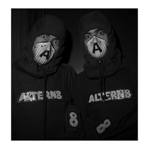 “Altern-8 occupy a unique position in dance music history…” Moby, Los Angeles, 2016
Altern-8 is a British Rave duo, featuring Mark Archer and Chris Peat. Best known in the early 1990s, their trademark was loud electronic tracks with a heavy bass line. On stage and in music videos, such as that for "Evapor-8", Altern-8's members wore face masks and chemical warfare suits.